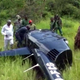 Jumanne Maghembe, the minister of tourism and natural resources, visits the wreckage of Gower’s helicopter.